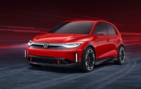 Красный Volkswagen ID. GTI Concept 2023 года с включенными фарами