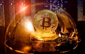 Bitcoin coin in a soap bubble