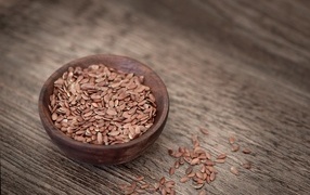 Flaxseeds on a gray table