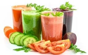 Fresh healthy smoothies with vegetables on a white background