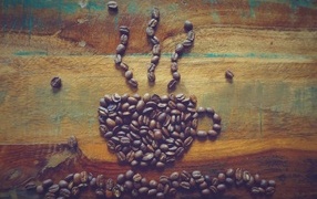 Кружка выложена из зерен кофе