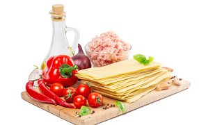 Products for lasagna on a white background
