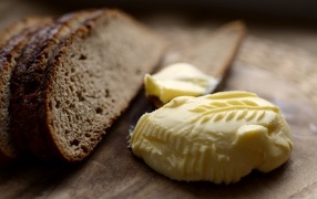 Butter with bread on the board