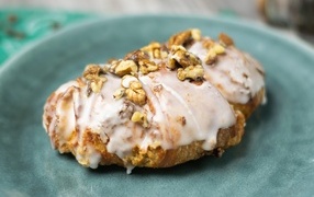 Croissant in glaze with nuts