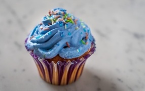 Cupcake with blue cream close-up