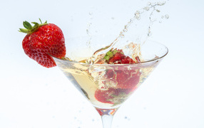 Cocktail with strawberry on white background