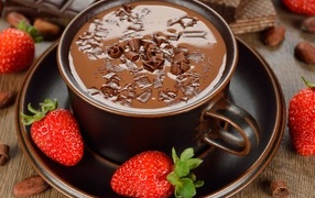 Hot chocolate in a mug with strawberries