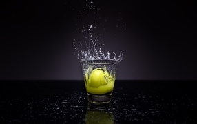 Splashes of water in a glass