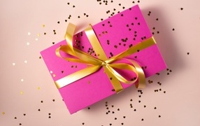 Large pink gift with ribbon bow