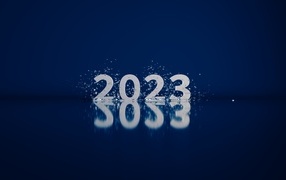 The inscription 2023 in water splashes on a blue background