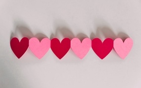 Paper hearts on a gray background
