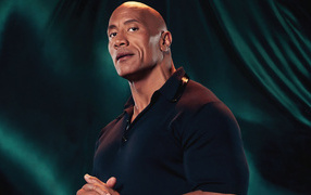 Actor Dwayne Johnson on a green background