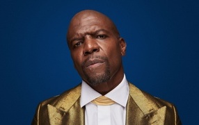 Actor Terry Crews on a blue background