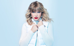 Beautiful blonde Taylor Swift on a blue background