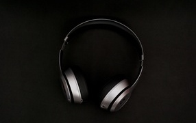 Headphones on a black background close-up