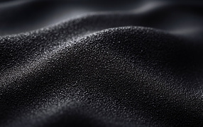 Waves of black sand