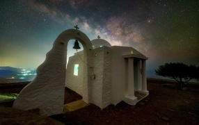 White church building under the starry sky
