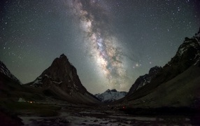 Beautiful milky way in the starry sky over the mountains