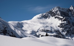 High mountains are covered with cold white snow