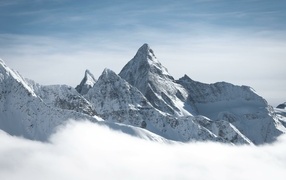 Mountain peaks covered with deep white snow