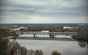 Old iron bridge across the river