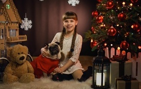 Маленькая девочка с собакой на новый год