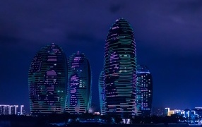 Skyscrapers of Sanya city at night, China
