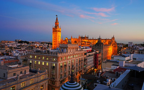 Beautiful view of the old houses of the city of Seville in the evening, Spain