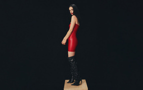 Яркая брюнетка актриса Кристен Риттер в красном платье на черном фоне