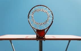 Large basketball hoop on a blue background