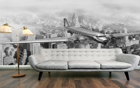 Sofa in a room with photo wallpaper