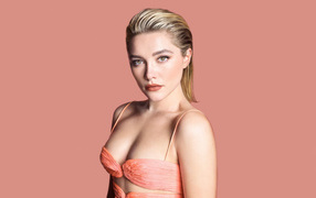 Young actress Florence Pugh on a pink background