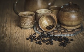 Coffee beans with utensils on the table