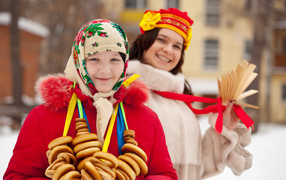 Girl with bagels for Maslenitsa 2024