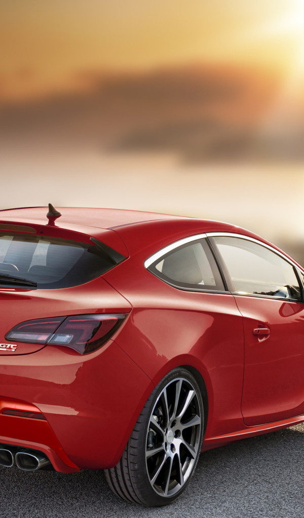 Test drive the car Opel Astra GTC 2014 