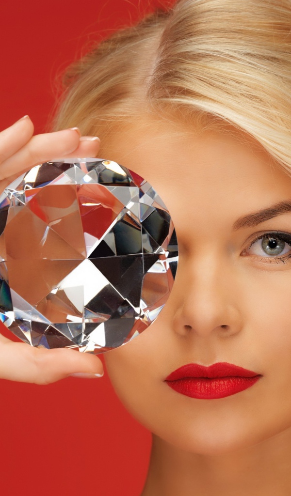 Large diamond in the hand of the girl