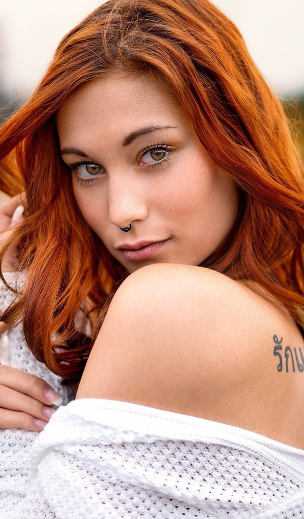 Red-haired girl with a nose ring