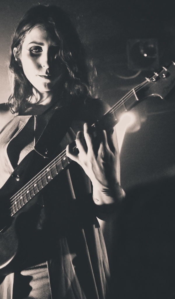 Chelsea Wolfe musician with a guitar