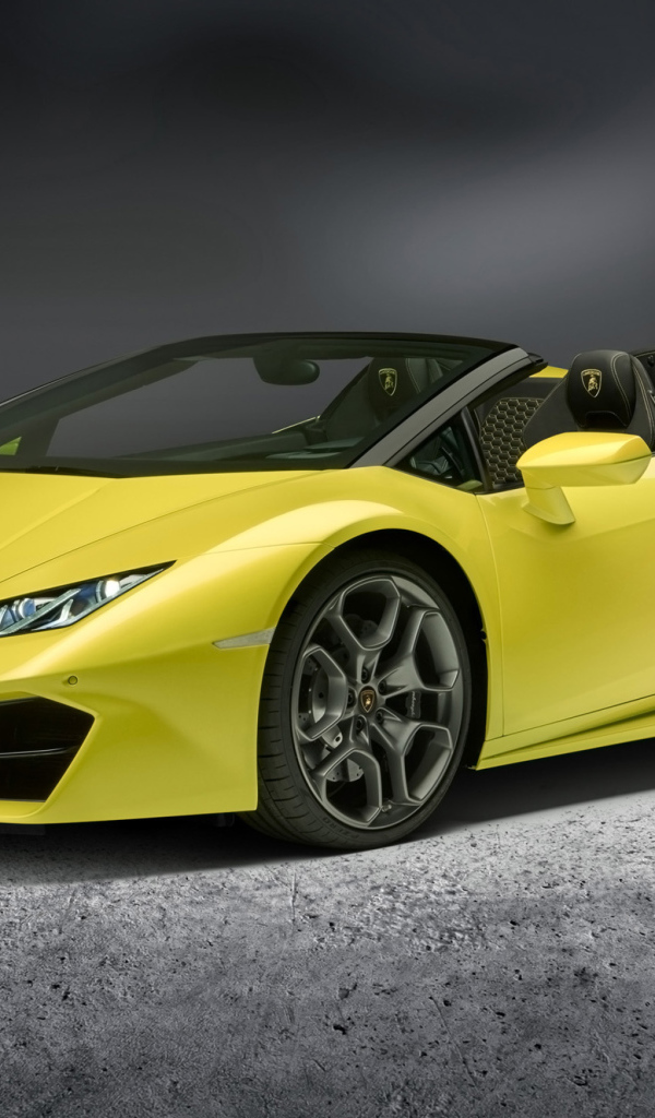 Желтый автомобиль кабриолет Lamborghini Huracan
