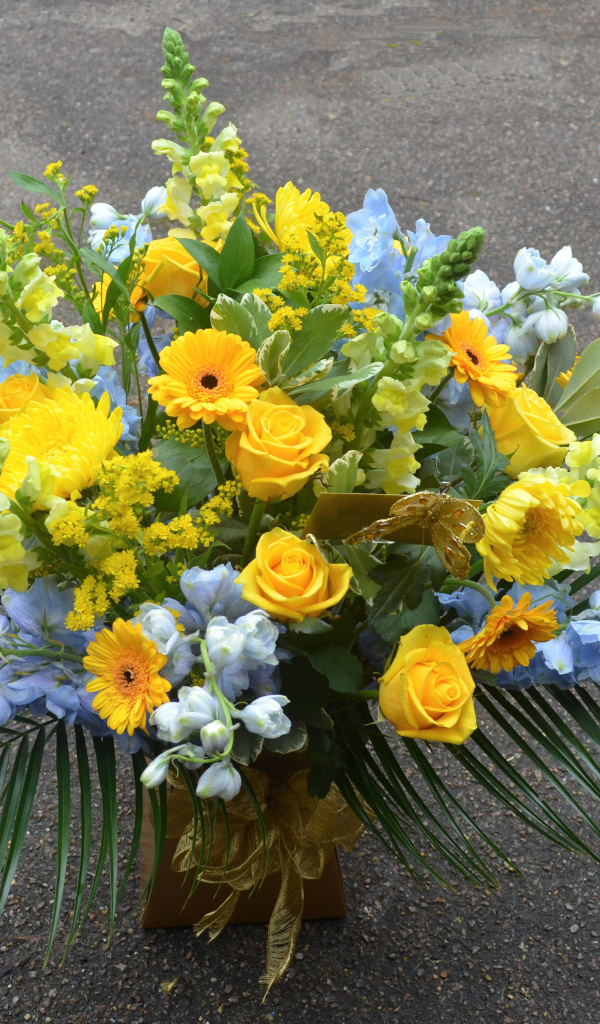 Beautiful bouquet of flowers gerbera, roses, lion's pharynx
