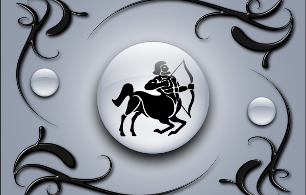 Sagittarius Sign on a gray background with black ornaments