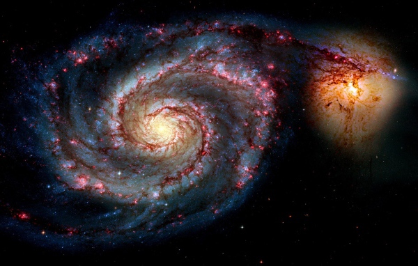 Слияние галактик в космосе