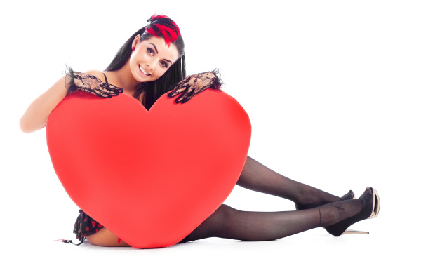 Beautiful girl with big red heart