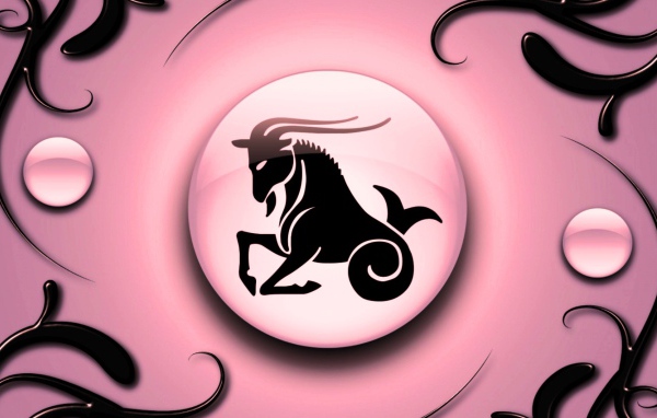 Знак зодиака Козерог на  розовом фоне с чёрным орнаментом 