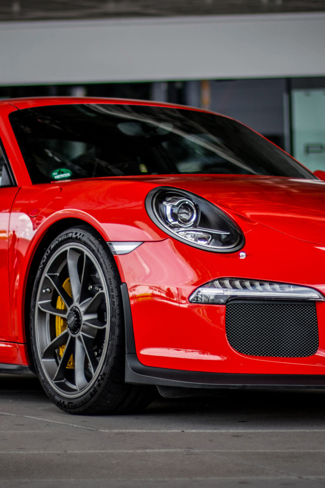 Красный спортивный автомобиль Porsche Drive Supercar