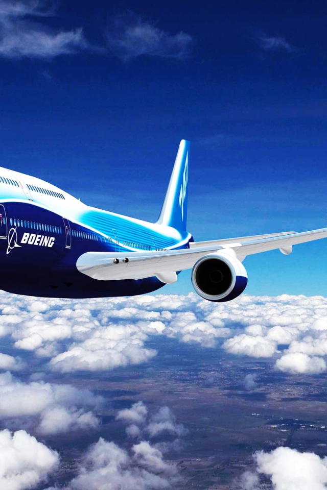 Boeing flies over the white clouds
