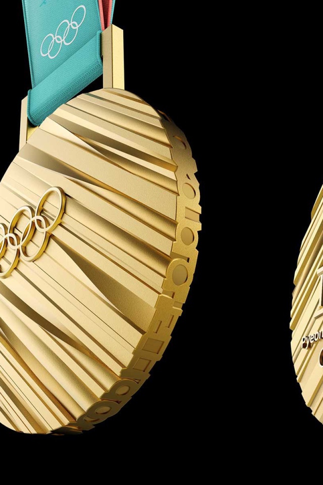 Золотая медаль зимних Олимпийских игр 2018 на черном фоне