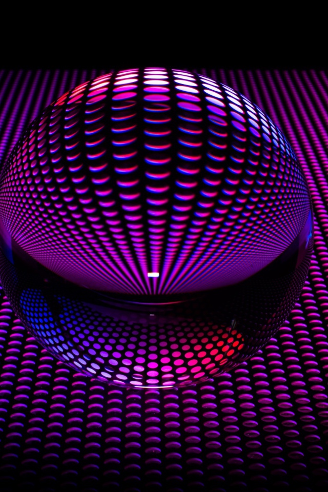 Large glass sphere on a purple background in 3D graphics