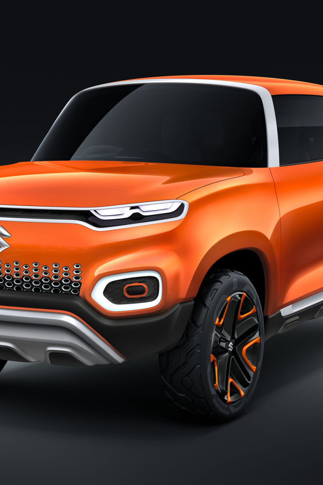 Оранжевый автомобиль Suzuki Concept Future S, 2018 на сером фоне