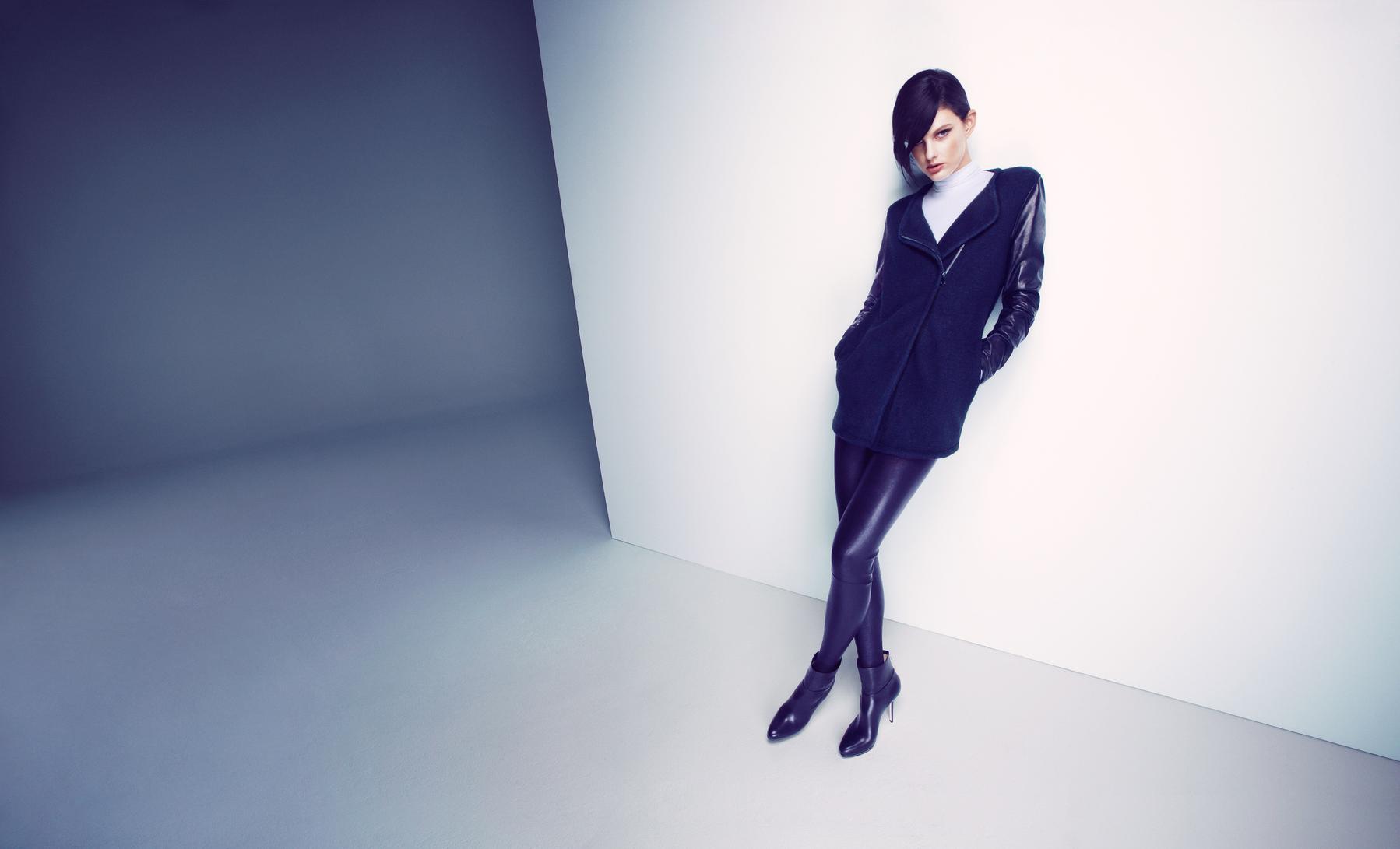 Photo of a girl in black in white room wallpapers and images